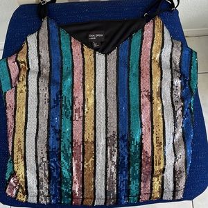 A medium colorful sequence top from Free Press. Only wore it twice.